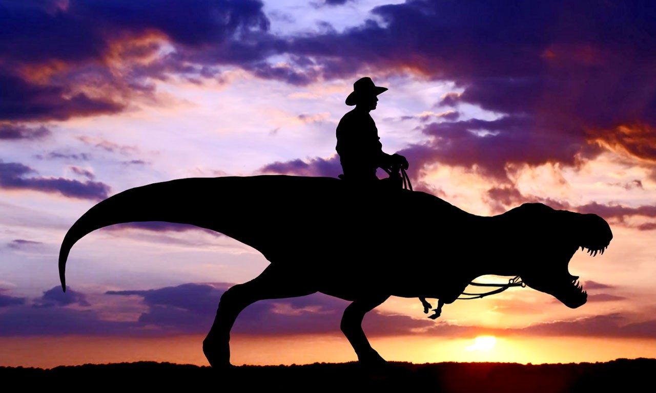 Ковбой верхом на динозавре